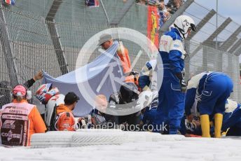 World © Octane Photographic Ltd. Formula 1 – British Grand Prix - Silverstone. Sunday 3rd July 2022. Race. Alfa Romeo F1 Team Orlen C42 - Guanyu Zhou is taken to the medical centre for a check up, later released uninjured.