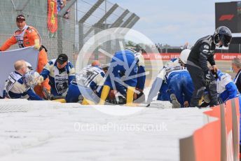 World © Octane Photographic Ltd. Formula 1 – British Grand Prix - Silverstone. Sunday 3rd July 2022. Race. Alfa Romeo F1 Team Orlen C42 - Guanyu Zhou is taken to the medical centre for a check up, later released uninjured.