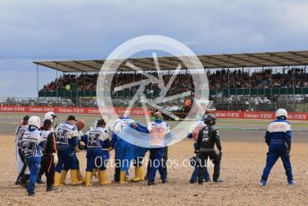 World © Octane Photographic Ltd. Formula 1 – British Grand Prix - Silverstone. Sunday 3rd July 2022. Race. Alfa Romeo F1 Team Orlen C42 - Guanyu Zhou is taken to the medical centre for a check up, later released uninjured.