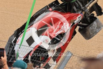 World © Octane Photographic Ltd. Formula 1 – British Grand Prix - Silverstone. Sunday 3rd July 2022. Race. Alfa Romeo F1 Team Orlen C42 - Guanyu Zhou'scar is removed from the barrier.