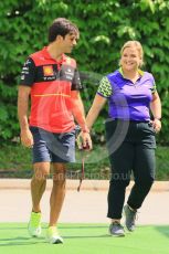 World © Octane Photographic Ltd. Formula 1 – Singapore Grand Prix - Marina Bay, Singapore. Friday 30th September 2022. Paddock. Scuderia Ferrari F1-75 - Carlos Sainz and W-Series Head of Communications Charlotte Sefton