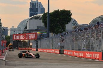 World © Octane Photographic Ltd. Formula 1 – Singapore Grand Prix - Marina Bay, Singapore. Friday 30th September 2022. Practice 1. Scuderia Ferrari F1-75 - Carlos Sainz and Oracle Red Bull Racing RB18 – Sergio Perez.