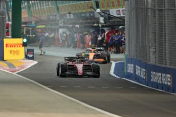 World © Octane Photographic Ltd. Formula 1 – Singapore Grand Prix - Marina Bay, Singapore. Friday 30th September 2022. Practice 1. Scuderia Ferrari F1-75 - Charles Leclerc and McLaren F1 Team MCL36 - Lando Norris.