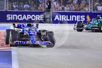 World © Octane Photographic Ltd. Formula 1 – Singapore Grand Prix - Marina Bay, Singapore. Friday 30th September 2022. Practice 2. BWT Alpine F1 Team A522 - Fernando Alonso and Aston Martin Aramco Cognizant F1 Team AMR22 - Lance Stroll.