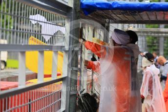 World © Octane Photographic Ltd. Formula 1 – Singapore Grand Prix - Marina Bay, Singapore. Saturday 1st October 2022. Practice 3. Double waved yellow _ white flags during water clearing on track.