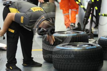 World © Octane Photographic Ltd. Formula 1 – Singapore Grand Prix - Marina Bay, Singapore. Saturday 1st October 2022. Practice 3. Pirelli inspecting used wet tyres taken from a Mercedes.