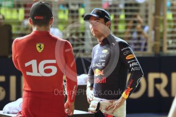 World © Octane Photographic Ltd. Formula 1 – Singapore Grand Prix - Marina Bay, Singapore. Saturday 1st October 2022. Qualifying. Oracle Red Bull Racing RB18 – Sergio Perez chats with Scuderia Ferrari F1-75 - Charles Leclerc.