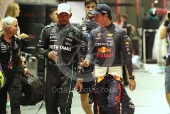 World © Octane Photographic Ltd. Formula 1 – Singapore Grand Prix - Marina Bay, Singapore. Saturday 1st October 2022. Qualifying. Mercedes-AMG Petronas F1 Team F1 W13 - Lewis Hamilton chats with Oracle Red Bull Racing RB18 – Sergio Perez.