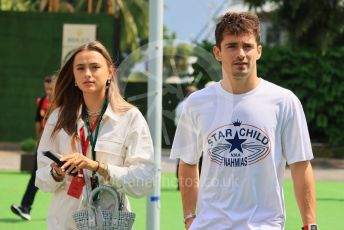 World © Octane Photographic Ltd. Formula 1 – Singapore Grand Prix - Marina Bay, Singapore. Saturday 1st October 2022. Paddock. Scuderia Ferrari F1-75 - Charles Leclerc and girlfriend Charlotte Sine.