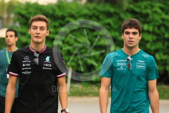 World © Octane Photographic Ltd. Formula 1 – Singapore Grand Prix - Marina Bay, Singapore. Saturday 1st October 2022. Paddock. Mercedes-AMG Petronas F1 Team F1 W13 - George Russell and Aston Martin Aramco Cognizant F1 Team AMR22 - Lance Stroll.