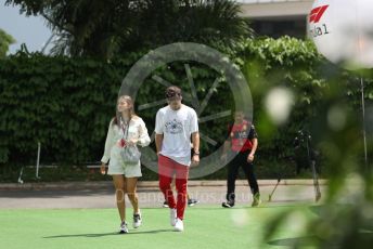 World © Octane Photographic Ltd. Formula 1 – Singapore Grand Prix - Marina Bay, Singapore. Saturday 1st October 2022. Paddock. Scuderia Ferrari F1-75 - Charles Leclerc and girlfriend Charlotte Sine.