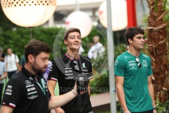 World © Octane Photographic Ltd. Formula 1 – Singapore Grand Prix - Marina Bay, Singapore. Saturday 1st October 2022. Paddock. Mercedes-AMG Petronas F1 Team F1 W13 - George Russell and Aston Martin Aramco Cognizant F1 Team AMR22 - Lance Stroll.