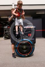 World © Octane Photographic Ltd. Formula 1 – Singapore Grand Prix - Marina Bay, Singapore. Thursday 29th September 2022. Pitlane. Oracle Red Bull Racing mechanic with son.