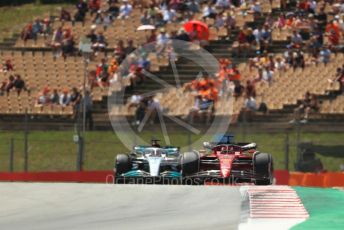 World © Octane Photographic Ltd. Formula 1 – Spanish Grand Prix - Circuit de Barcelona-Catalunya. Friday 20th May 2022 Practice 1. Scuderia Ferrari F1-75 - Charles Leclerc and Mercedes-AMG Petronas F1 Team F1 W13 - George Russell.