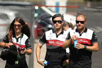 World © Octane Photographic Ltd. Formula 1 – Spanish Grand Prix - Circuit de Barcelona-Catalunya. Saturday 21st May 2022 Paddock. Alfa Romeo F1 Team Orlen C42 - Guanyu Zhou and Valtteri Bottas.