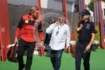 World © Octane Photographic Ltd. Formula 1 – Spanish Grand Prix - Circuit de Barcelona-Catalunya. Saturday 21st May 2022 Paddock. Oracle Red Bull Racing Chief Technical Officer - Adrian Newey and Scuderia Ferrari Gino Rosato with Louis Camileri (ex-CEO Ferrari)