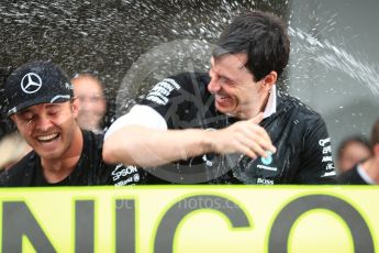 World © Octane Photographic Ltd. Mercedes AMG Petronas - Nico Rosberg, and Toto Wolff. Sunday 9th October 2016, F1 Japanese GP - World Constructors Champions 2016 celebrations. Suzuka Circuit, Suzuka, Japan. Digital Ref :1738LB1D8848