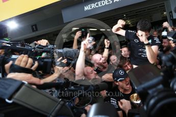 World © Octane Photographic Ltd. Mercedes AMG Petronas - Nico Rosberg and the team celebrate. Sunday 9th October 2016, F1 Japanese GP - World Constructors Champions 2016 celebrations. Suzuka Circuit, Suzuka, Japan. Digital Ref :1738LB2D4671