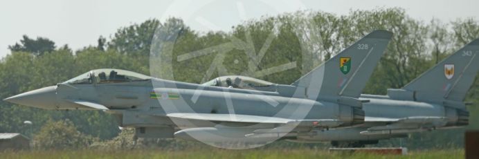 RAF Coningsby. Eurofighter Typhoon FGR4s ZK328 (3 Sqn) with targeting pod and ZK343 (1 Sqn) with targeting pod and Paveway laser guided bomb ready for takeoff. 2nd June 2021. World © Octane Photographic Ltd.